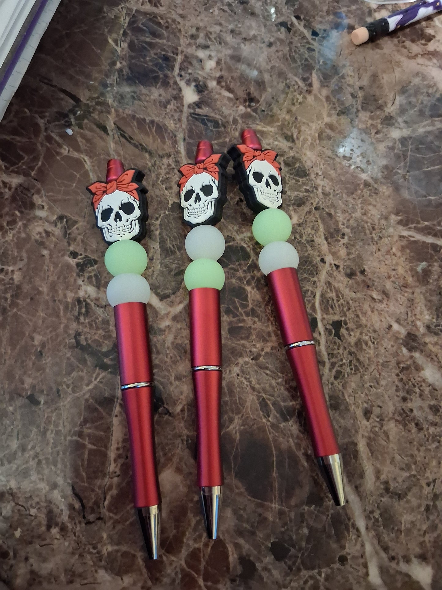Skull pens with glow in the dark beads